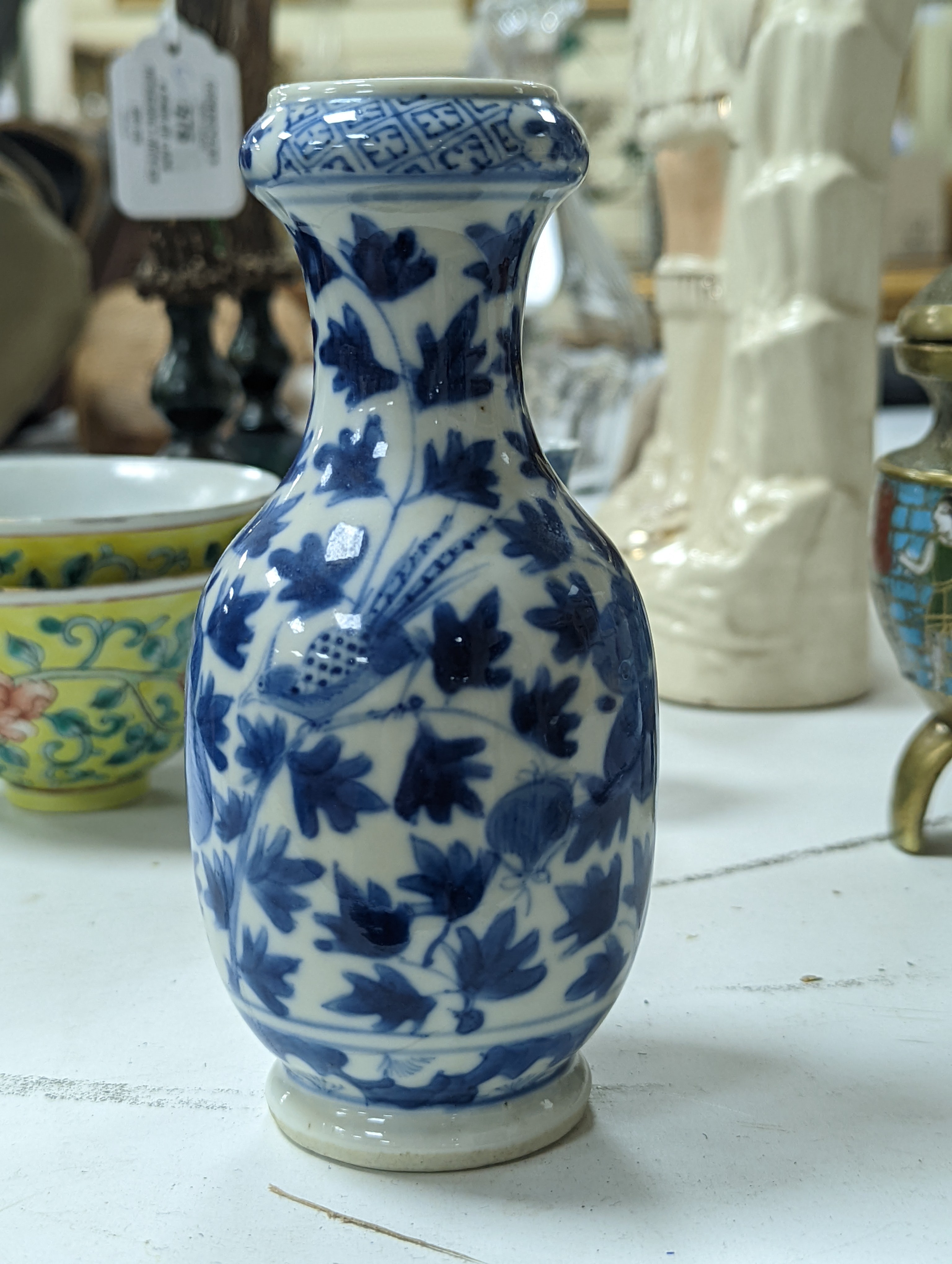 A group of Chinese porcelain, 19th /20th century, to include a pair of yellow ground bowls, 10.8 cm diameter, a blue and white vase, Xuande mark, a similar bowl and vase, and a champleve enamel bronze koro and cover